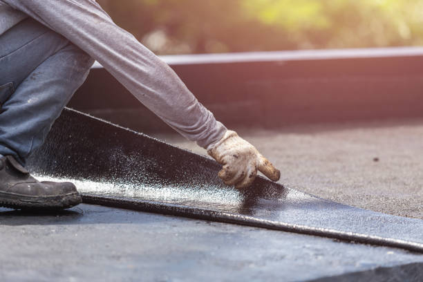 Professional Waterproofing technician working in Woodbury, NY
